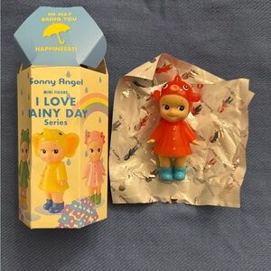 Sonny Angel Mini Figure in Red Raincoat